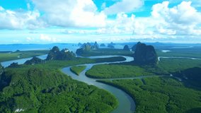 Aerial view over the bends river and mangrove forests during sunrise. One of the world's most beautiful bay. Samed Nang Chee, Phang Nga, Thailand. Tropical Forest Background. Travel concept
