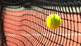 Super Slow Motion Shot of Tennis Ball Hitting the Net on Court at 1000fps. - Powered by Shutterstock - Get 15% off with code: PIKWIZARD15