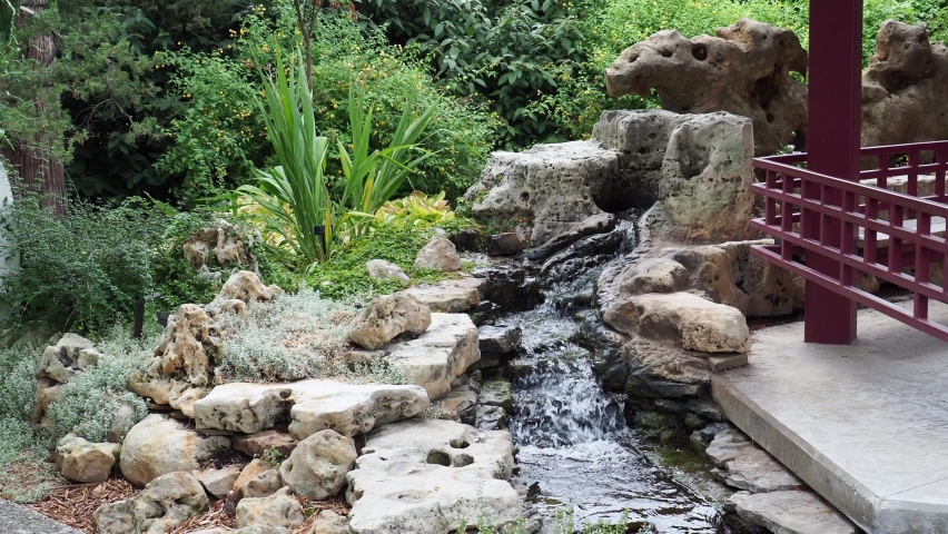 Peaceful waterfall at a local community garden in Wichita Kansas