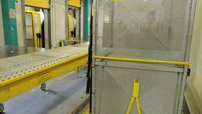 Male warehouse worker is pushing a parcel box truck inside the warehouse. - Powered by Shutterstock - Get 15% off with code: PIKWIZARD15