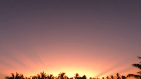 Colorful morning sunrise n Pastel  pink sun light ray or bright golden beam on dramatic purple red sky in tropical summer or spring sunlight n sunray, Slow Motion 4k b-roll TimeLapse footage video 