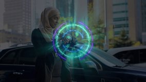 Animation of abstract circles against asian woman in hijab checking time by cars on city street. Digital composite, multiple exposure, city life, travel, architecture, transportation, waiting. - Powered by Shutterstock - Get 15% off with code: PIKWIZARD15