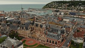 Drone video of a view of the Benedictine Palace located in the city of F camp in Normandy in northern France. European city on the banks of the English Channel, bird's eye view of the historic