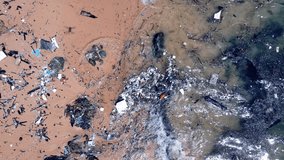 Aerial view high angle view Video slow motion The sea is contaminated by human-caused waste. in island Phuket Thailand. Tropical sea Andaman sea Location Phuket Thailand. Nature And travel Video 
