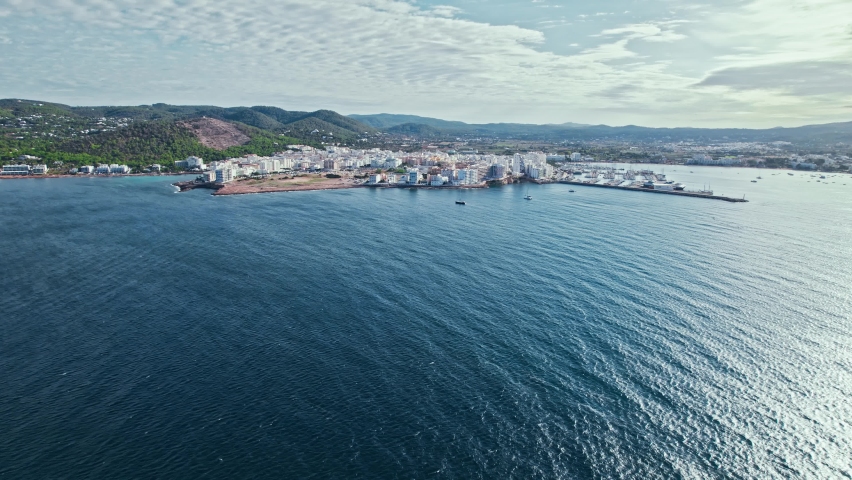 Skyscrapers buildings modern apartments in the centre of Sant Antoni de Portmany. Aerial drone view of Modern city with houses and resorts on Ibiza, Balearic Islands, Spain.