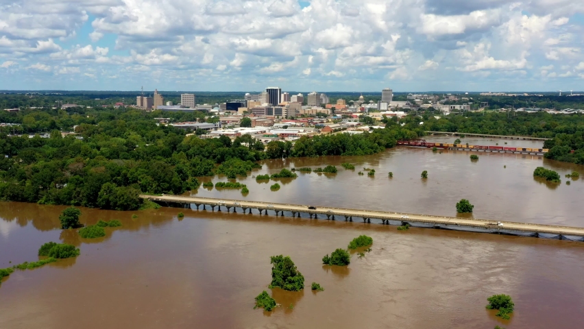 Jackson, MS Skyline with flooding Pearl River in the foreground in August 2022