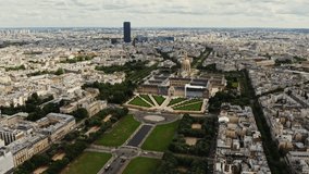 Architectural complex and park area of Les Invalides in the historic center of Paris, bird's eye view video on a cloudy day. Cityscape of Paris from drone, France