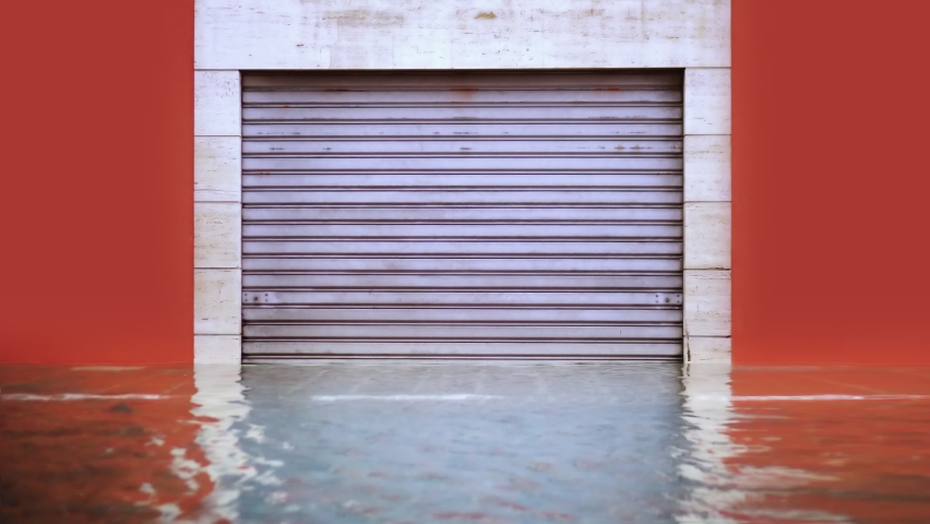 Exterior of the garage flooded by water