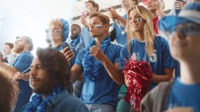 Sport Stadium Soccer Match: Portrait of Excited Caucasian Couple Cheering Team to Win, Use Smartphone to Check App, Bet, Score, Winnings. Crowd Celebrate Goal, Championship Victory. Slow Motion - Powered by Shutterstock - Get 15% off with code: PIKWIZARD15