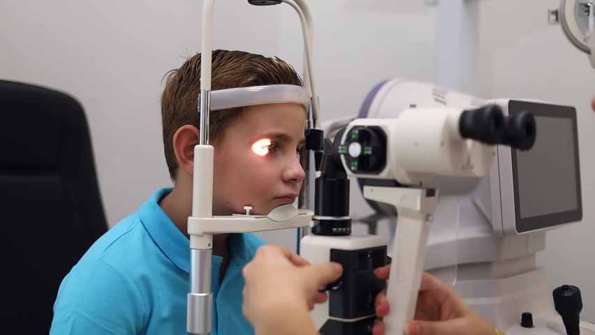 examination of a child with a cutting lamp, a microscope, and a focused light source. device for high-precision examination of the eye to determine the condition of the lens, the cornea.	
 Royalty-Free Stock Footage #1093797949
