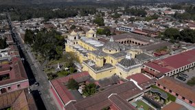 Beautiful aerial cinematic footage of Chichicastenango, its amazing Church, the traditional Textil Market and colorful graveyard cemetery