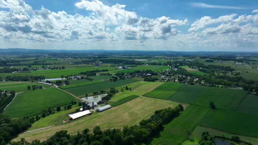 Airplane view of rural farmland. Flight on summer day.
