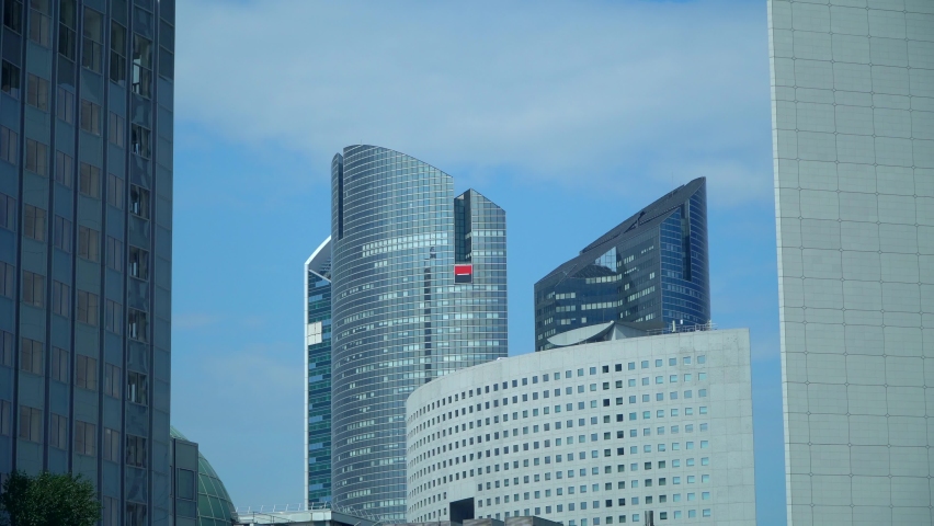 Aerial view of the roofs of buildings, streets and avenues with car traffic, modern and classical architecture. Tourists. Architecture. France Paris 09.2022
