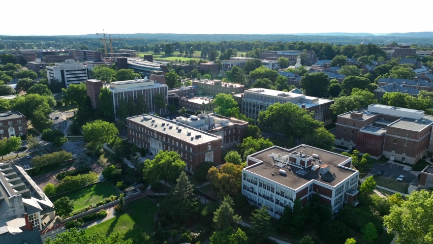 College university campus at Penn State, University Park, State College PA. PSU aerial of academic buildings in summer. Royalty-Free Stock Footage #1093836935