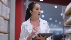 smart confidence asian female startup entrepreneur small business owner businesswoman wear smart casual cloth smile hand use tablet woking inventory checking in showroom office daytime background - Powered by Shutterstock - Get 15% off with code: PIKWIZARD15