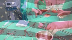 Animation of flag of usa waving over surgeons in operating theatre. Global medicine healthcare services during covid pandemic concept digitally generated video.