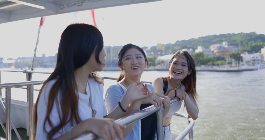 Three Asian girls go on a local trip in Kaohsiung, Taiwan	
