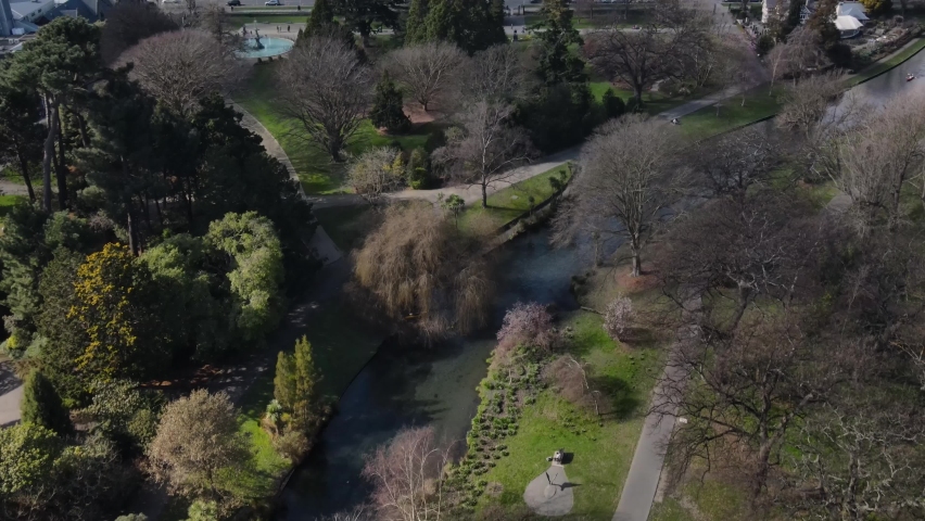 Spectacular aerial reval over Botanic Garden, historic Anglican buildings to central city. Christchurch, New Zealand