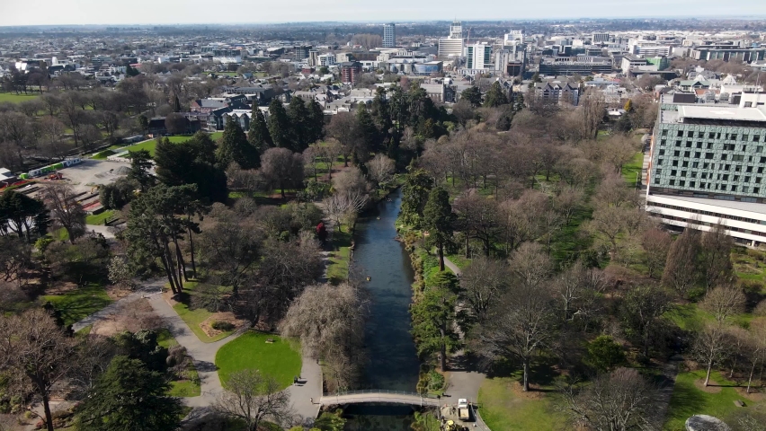 Avon River in Christchurch Botanic Park and cityscape of central district. New Zealand aerial