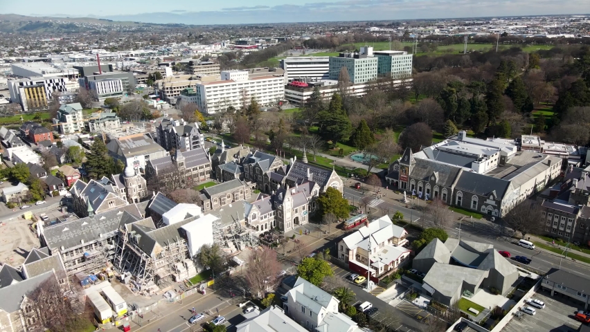 Beautiful aerial orbit Christchurch cityscape. Old town with museum, gallery, university building reveal of CBD.