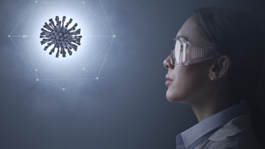Woman scientist in lab glasses looking at 3d rotating model of coronavirus inside molecular structure - Powered by Shutterstock - Get 15% off with code: PIKWIZARD15