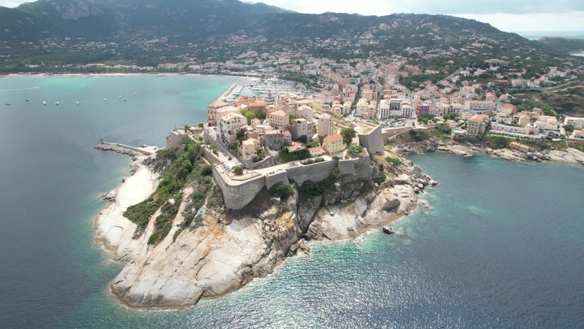 Drone video of the city of Calvi, Corsica Royalty-Free Stock Footage #1093859933