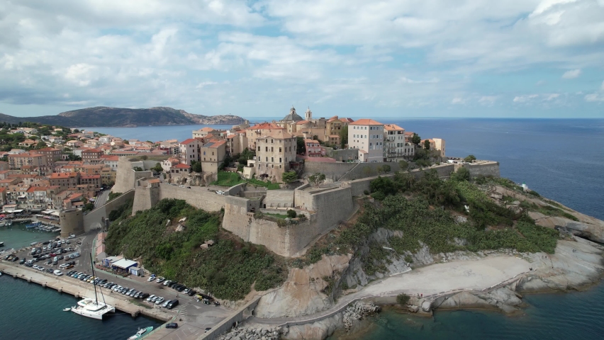 Drone video of the city of Calvi, Corsica Royalty-Free Stock Footage #1093859935