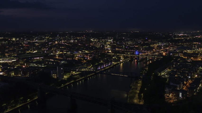 Establishing Aerial View Shot of Newcastle upon Tyne UK, Tyne and Wear, England United Kingdom deep night, slow tracking left