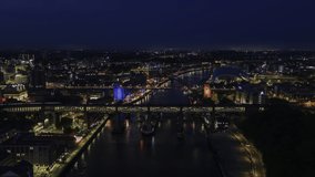 Establishing Aerial View Shot of Newcastle upon Tyne UK, Tyne and Wear, England United Kingdom night evening, city briges, super clear view