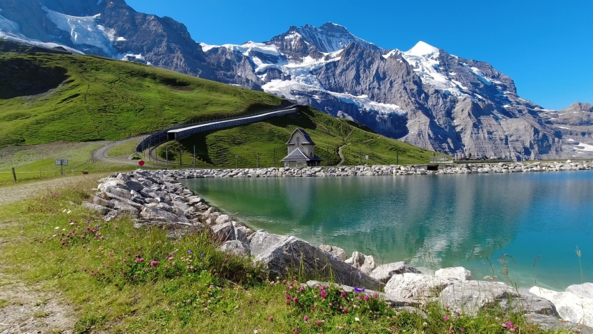 Beautiful alpine mountain landscape in Switzerland. Mountain lake and in Swiss Alpsa