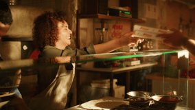 In Small Business Family Restaurant: Professional Couple of Chefs Preparing Pizza, Traditional Family Recipe, Giving Boxes to a Happy Customer. Online Order Delivery Pizzeria, Cooking Organic Food - Powered by Shutterstock - Get 15% off with code: PIKWIZARD15