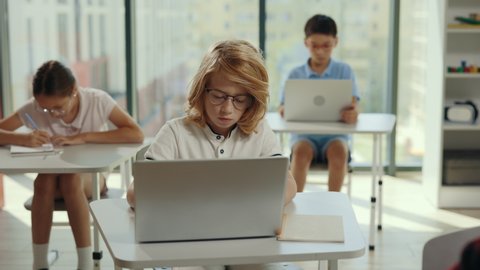 School Boy Using Computer Sitting Class Stock Footage Video (100% ...