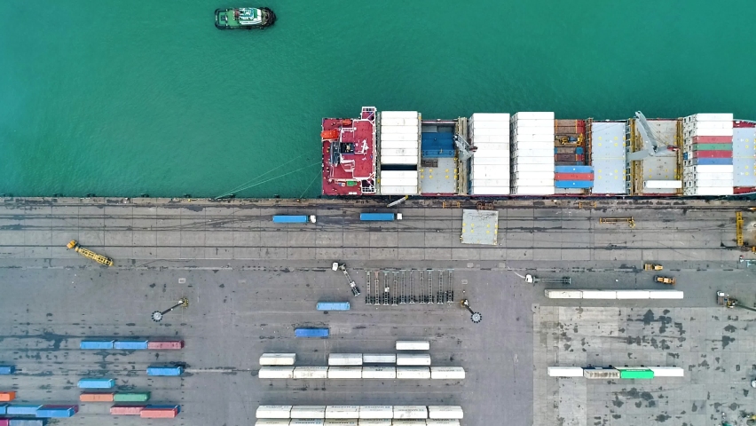 Cargo Vessel At The Container Terminal In Puerto Limon, Costa Rica. aerial drone top-down