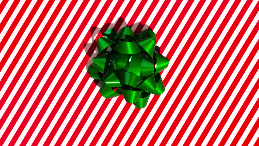 Unwrapping gift revealing a blue screen - Stop Motion Animation with Alpha Channel (Transparent Background) - Green bow on red and white wrapping paper Royalty-Free Stock Footage #1093906389