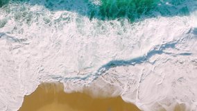 Top View of the Giant Waves, Foaming and Splashing in the Ocean, Sunny Day, Slow Motion Video, California, USA. Cinematic slow motion water background with copy space. Freedom, tourism, environment 
