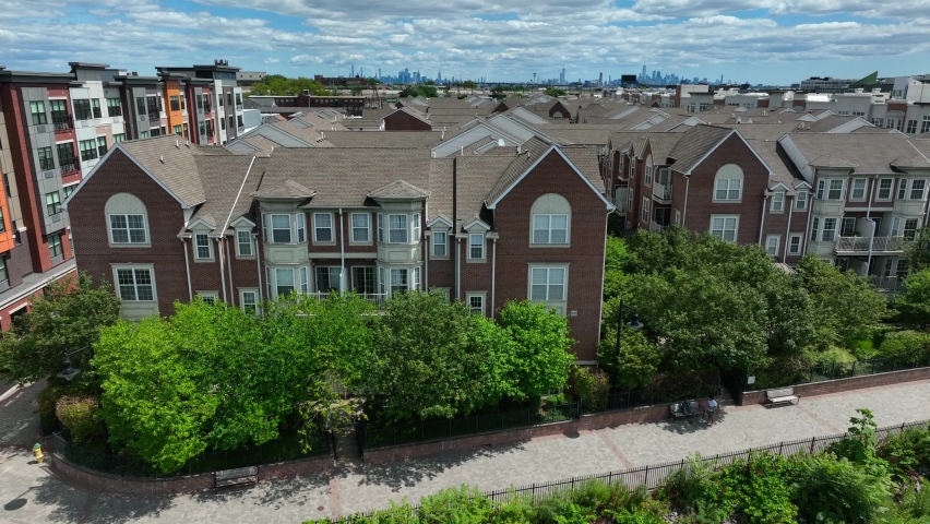 Apartment complex in Newark, New Jersey. Establishing shot of multi-story new, luxury homes. Real estate theme.
