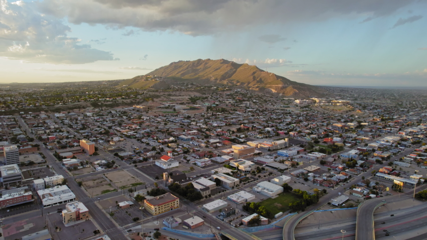 El Paso Texas Drone. Aerial Drone View Of Central El Paso Area During Sunset With Franklin Mountains Landmark In The Background And A Beautiful Blue Sky.