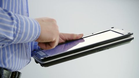 man working on tablet PC with touch screen