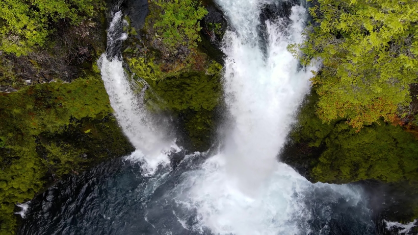 Aerial shot of the amazing Koosah Falls and lush moss covered forest on the McKenzie River in Oregon.