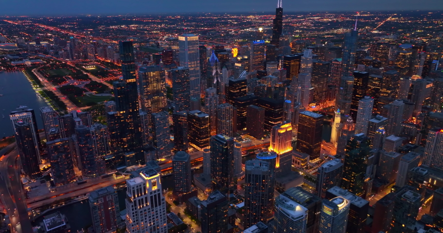 Eye-catching view of Chicago downtown in the evening. Stunning metropolis in lights from view above.