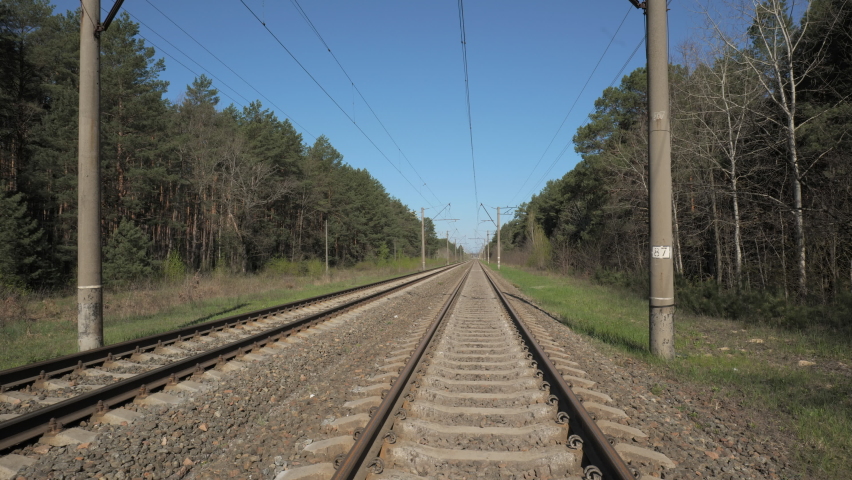 Camera moves along the railroad. 4K