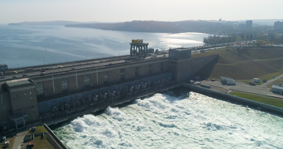Aerial Drone Footage, Giant Dam on Angara River. Water Dam and Reservoir Lake Generating Hydro Electricity Power Renewable Energy. Hydroelectric Power Station, Hydro Energy. High Quality 4k | Shutterstock HD Video #1093990709