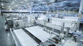 mechanization shop. industrial workshop in which the automatic production of fiberglass threads. fiberglass production. factory. industrial shop. automation - Powered by Shutterstock - Get 15% off with code: PIKWIZARD15