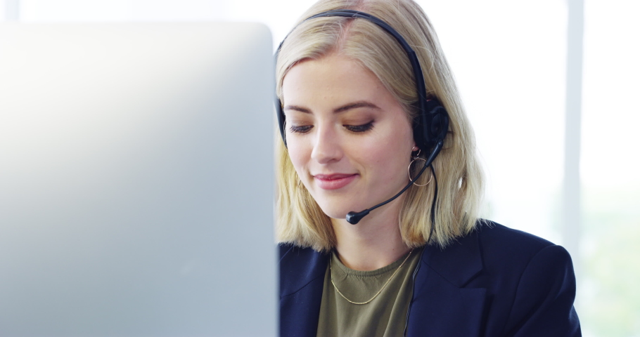 Contact us, call center and customer service with a woman working in sales, telemarketing or crm with a headset. Support, help and consulting with a young female consultant in her office at work | Shutterstock HD Video #1093999155