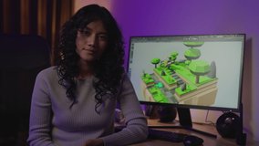Female game developer present her concept game design to team. She using video call to present her project at home. She makes games designed by 3D animation software. - Powered by Shutterstock - Get 15% off with code: PIKWIZARD15