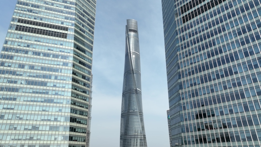 Skyscrapers and landmark buildings in downtown. Drone aerial view. Tall buildings in Lujiazui financial district in Shanghai China. Economy business, cityscape concept b-roll footage.