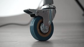 a spinning wheel of a mobile rack with clothes or lighting equipment in the studio or at a show - Powered by Shutterstock - Get 15% off with code: PIKWIZARD15