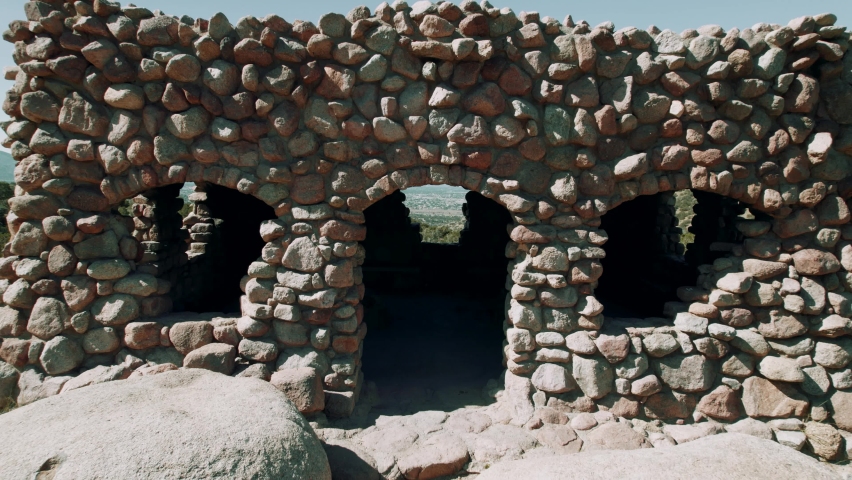 Primitive Rock Structure near the Mountains