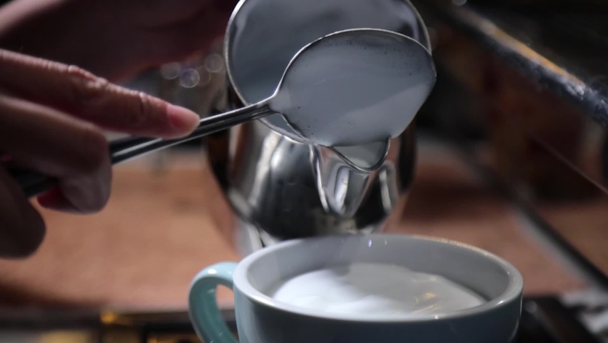 Barista Pour Milk Froth For Making Latte Art,The Professional Barista is Making Specialty Coffee in Latte Art Menu Royalty-Free Stock Footage #1094060919