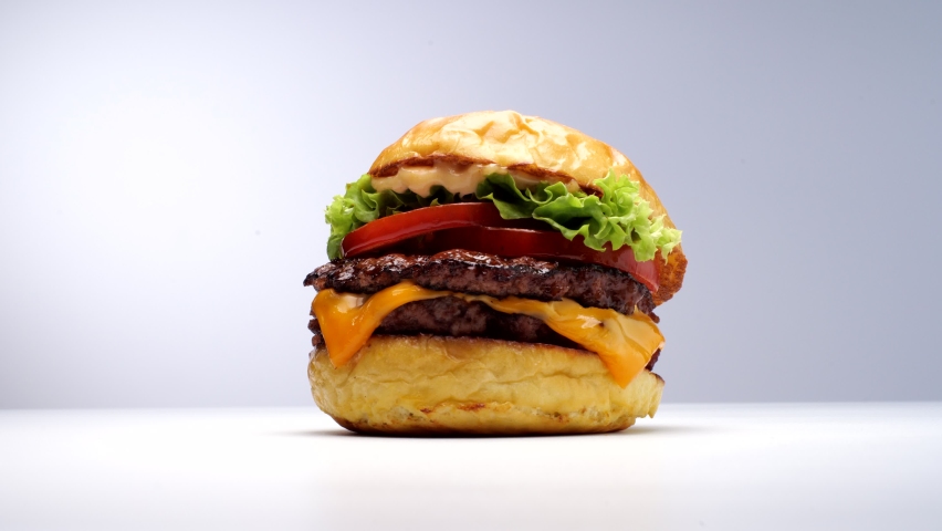 Tasty burger studio shot close up Royalty-Free Stock Footage #1094068521